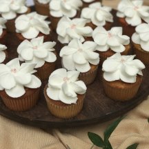 White Flower with Blush Pearls Cupcake