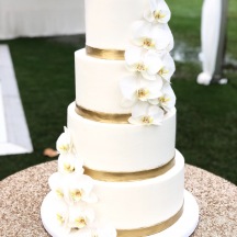 Smooth Clean Buttercream with Gold Bands and Orchids